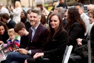 Mark Hampton and Christina Ricci attend the Hollywood Walk of Fame Star Ceremony with their children in the background. (Image via Getty)
